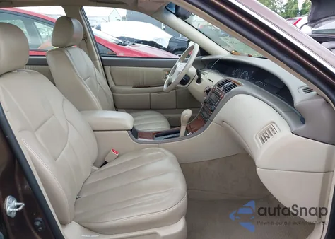 2000 Toyota Avalon Xls z USA, uszkodzony, nr VIN 4T1BF28B9YU067916